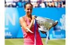 EASTBOURNE, ENGLAND - JUNE 21:  Madison Keys of the USA celebrates with the trophy after defeating Angelique Kerber of Germany in the Women's Final at the Aegon International at Devonshire Park on June 21, 2014 in Eastbourne, England.  (Photo by Ben Hoskins/Getty Images)